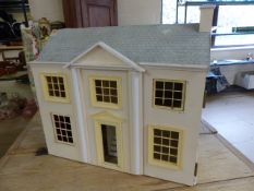 Small two door dolls house in white