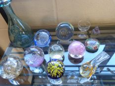 Coloured glass paperweights to include a Wedgwood bird