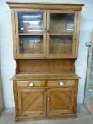 Large pine dresser with cupboards over and white handles