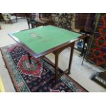 Antique mahogany games table