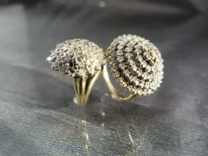 Two Diamond multi stone cluster Rings. (1) 9ct Gold Target cluster ring with 5 rings of small