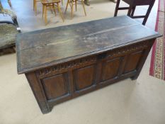 Antique oak coffer on block feet with two planked top