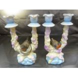 Pair of unusual twin armed candle sticks with Robins seated to middle both marked XX to base. Tail