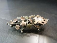 A late Victorian hallmarked silver and gold sweetheart brooch by Sheldon Brothers hallmarked