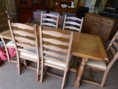 Modern oak country style table with stretchers and 6 chairs. Good Condition