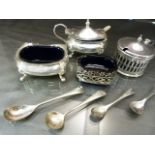 Four silver hallmarked salts and one EPNS with various spoons (silver & EPNS) all with blue glass