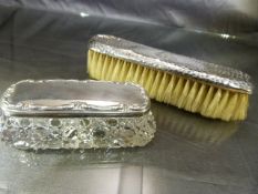 Silver hallmarked dressing table items. Silver topped brush & silver lidded glass pot