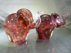 WEDGWOOD GLASSWARE - Pair of Wedgwood elephants in a pink mottled tone.
