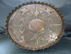 Art Nouveau oval copper tray with stylised flowers and crimped edging.