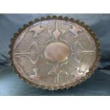 Art Nouveau oval copper tray with stylised flowers and crimped edging.