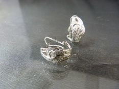 Pair of white gold and diamond earrings