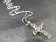 18ct white gold pierced cross on 18ct gold chain, cross set with diamonds