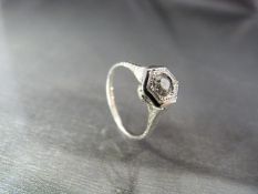 14ct white gold and diamond solitaire in a hexagonal setting