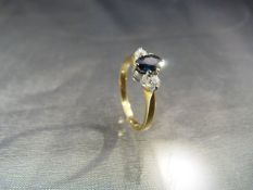Three stone Sapphire and Diamond Trilogy ring with Oval Sapphire and 9ct ring