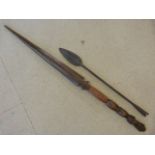 Tribal Spear head poss African and a carved wooden souvenir spear.