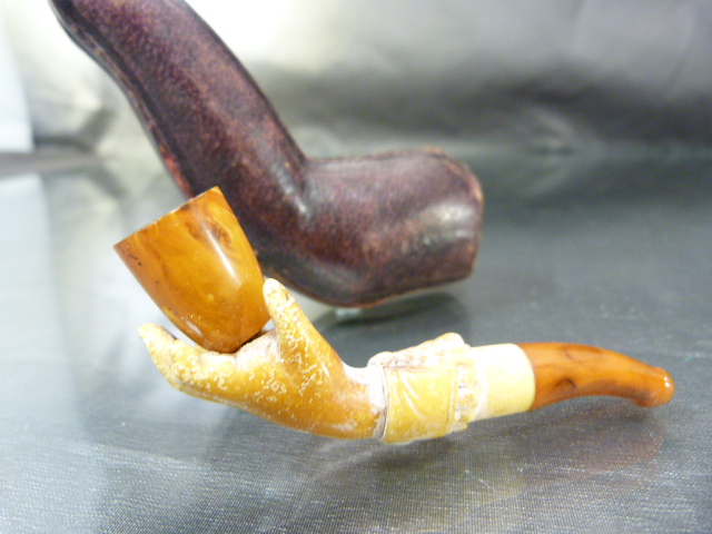 Carved Meerschaum in the form of a hand holding a bowl. Bowl made from amber as is the Mouthpiece in - Image 2 of 7