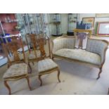 Edwardian Inlaid part salon suite compromising four chairs and a two seater settee. Sofa with open