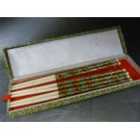 Set of six highly decorated chopsticks