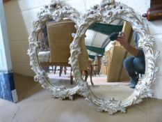 Pair of ornate mirrors