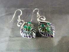 Pair of silver CZ and faux emerald earrings