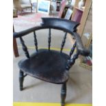 Oak smokers chair with scrolled arms