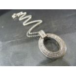 Silver and CZ Doughnut pendant necklace