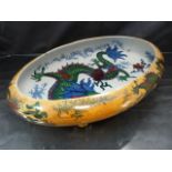 Bursley Ware Dragon lustre water bowl designed by Frederick Rhead, of compressed form on four
