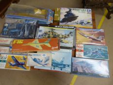Box containing various model kit planes