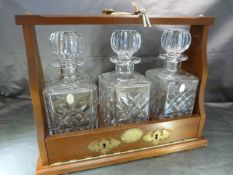 Mahogany Tantalus with Three Royal Doulton Decanters