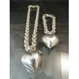 Matching silver 925 hallmarked Necklace and bracelet by WEMPE with large heart pendants that chime