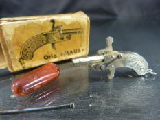 GERMAN MINIATURE PERCUSSION CAP PISTOL by Maus, with cleaning rod, and caps, 4cm long in original