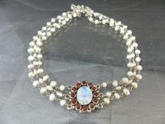 Silver Choker Necklace, central oval Moonstone approx: 10mm x 12mm, surrounded by 12 approx: 3.