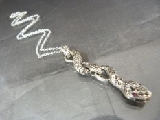 Silver and marcasite snake pendant necklace with ruby eyes