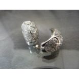 Pair of silver and CZ heavy-set half hoop-style earrings