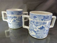 Pair of unmarked blue and white Willow Pattern loving cups with twin handles