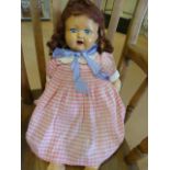 Antique Composite bodied doll with Blue sleeping eyes and open mouth. All limbs moving.Brunette