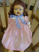 Antique Composite bodied doll with Blue sleeping eyes and open mouth. All limbs moving.Brunette