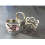 Three silver rings including 1 set with Mother of Pearl stones approx weight - 14.9g
