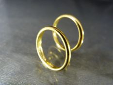 Pair of 22ct gold hallmarked wedding bands (total weight approx 6.8g)