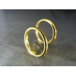 Pair of 22ct gold hallmarked wedding bands (total weight approx 6.8g)