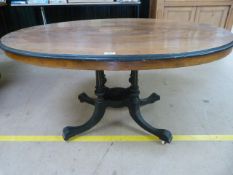 Edwardian inlaid Rosewood veneered oval table with black quattro leg base
