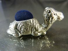 Silver pincushion in the form of a camel