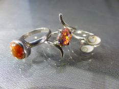 Three silver Gem set rings - approx weight - 6.8g