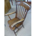 Windsor type armchair with large curved rail to back