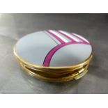 Stratton Art Deco compact decorated in pink grey and white. Marked Stratton to inner pad tray