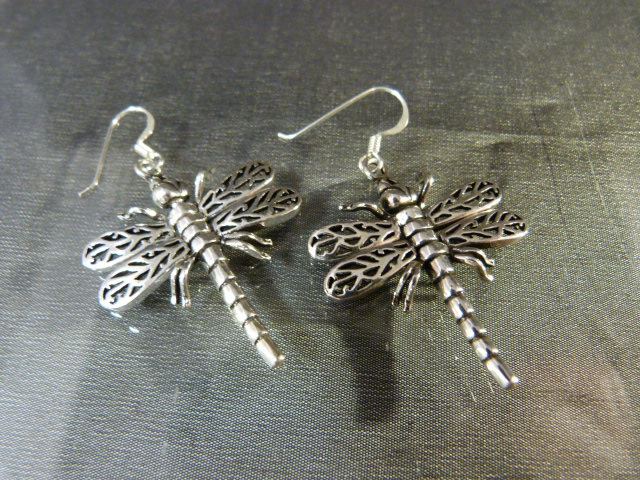 Pair of silver earrings in the form of dragonfies