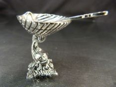 Silver Tazza with dolphin base and spoon