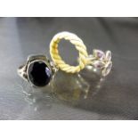 Two Gemset silver rings and 1 bone and banded gold wire ring
