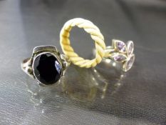 Two Gemset silver rings and 1 bone and banded gold wire ring