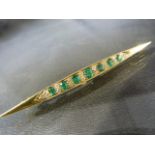 Diamond & Emerald Victorian Bar brooch consisting of seven graduated Emeralds set with eighteen